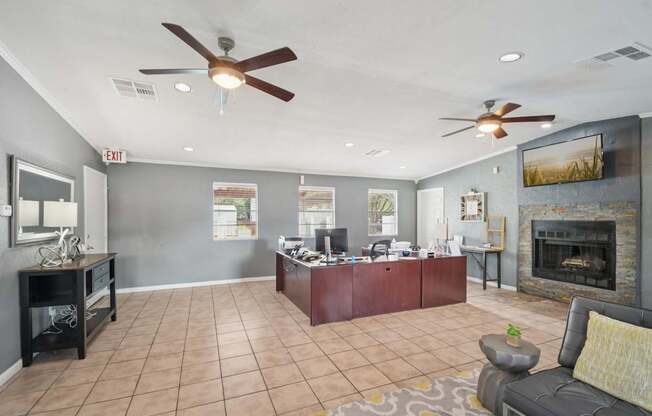 A living room with a fireplace and a couch.