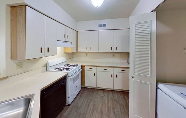 Kitchen with Dishwasher at The Highlands Apartments, Indiana