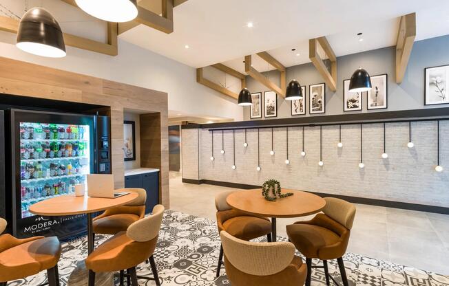 Grab a seat and recharge in this stylish lounge, complete with café seating, artistic design, and convenient vending options.