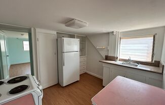 2-bedroom with den, 1-bath downstairs unit