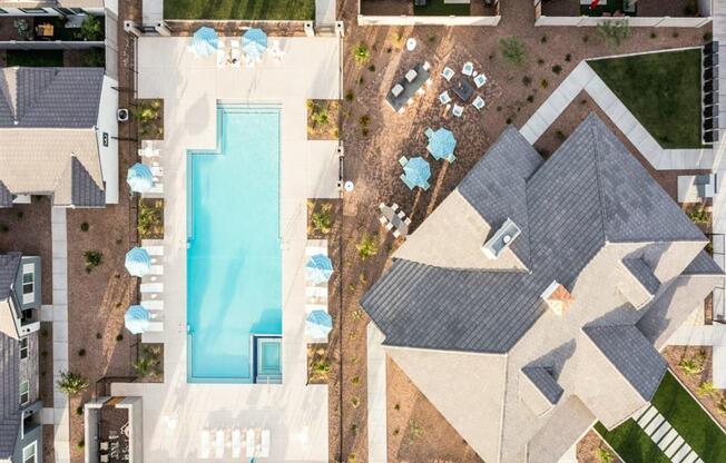 view of pool and clubhouse