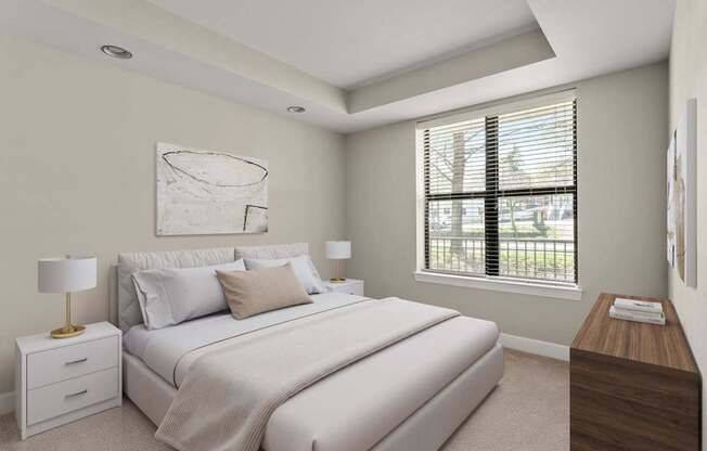 A bedroom with a large bed, nightstands, and a painting on the wall.