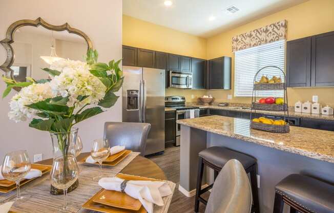 Dining Area & Kitchen (3 Bedroom) at Palm Valley Villas in Goodyear, AZ