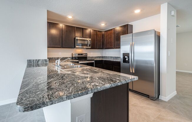 3 bedroom 2 bathroom 2 car garage home with pond view