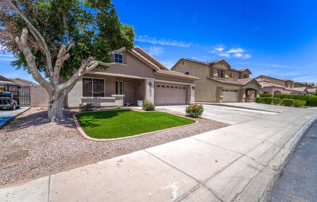 Your Goodyear Retreat Awaits – Updated 4BR Home with Pool & Waterfall