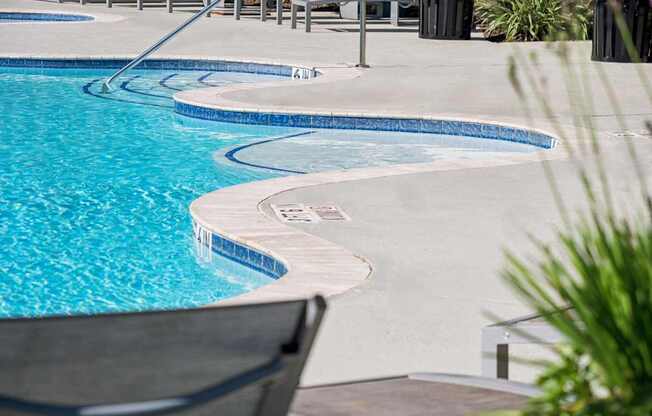 Swimming pool at Berkshire Jones Forest apartments in Conroe, TX