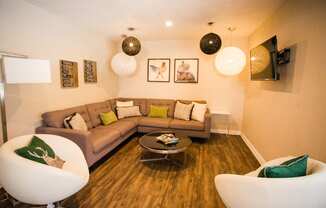 a living room with a couch and a table