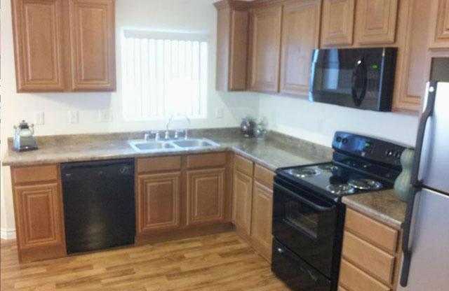 updated kitchen with black appliances