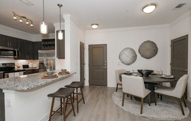 Dining And Kitchen at Cue Luxury Apartments, Cypress, Texas