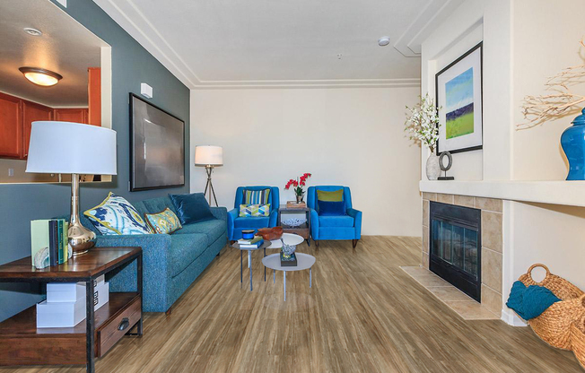 a living room filled with furniture and a tv