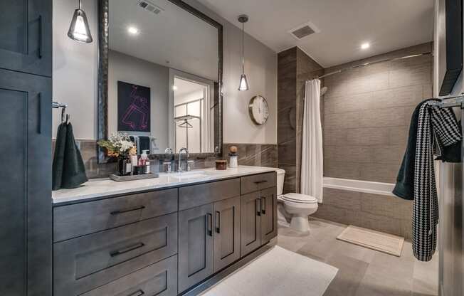 Designer Granite Countertops In All Bathrooms at The Hamilton, Texas