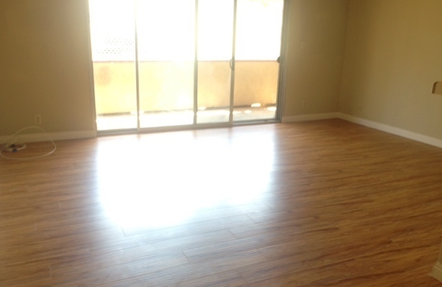 DOWNSTAIRS CONDO W/PATIO- WHEELCHAIR ACCESSIBLE UNIT+ Laminate FLRS+LAUNDRY IN BLDG