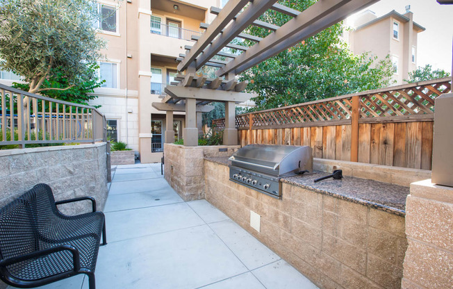 Pet-Friendly Apartments in San Jose, CA- Aviara- BBQ Pit, Seating Area, and Landscaping