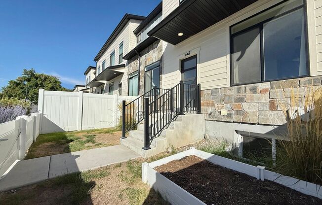 4-Bedroom Midvale Townhome | Garage + Pets Allowed + Great Location