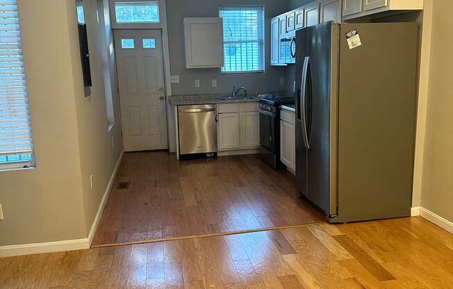 Newly Renovated, Spacious Home for Rent! Large Rooms with Beautiful Hardwood Flooring Throughout! W/D! Central Air! Fenced in Yard! Available Now!