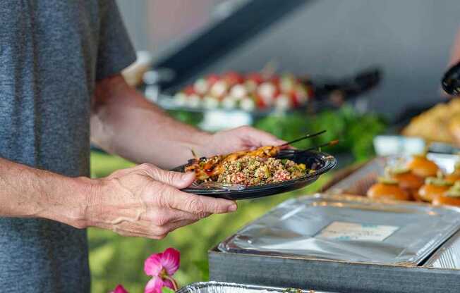 Sampling good food at the West Half Pool Party