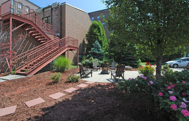 Outdoor seating and fire pit at Bancroft Luxury Apartments. Apartments in Saginaw