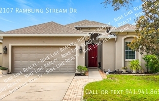 12107 RAMBLING STRM DR