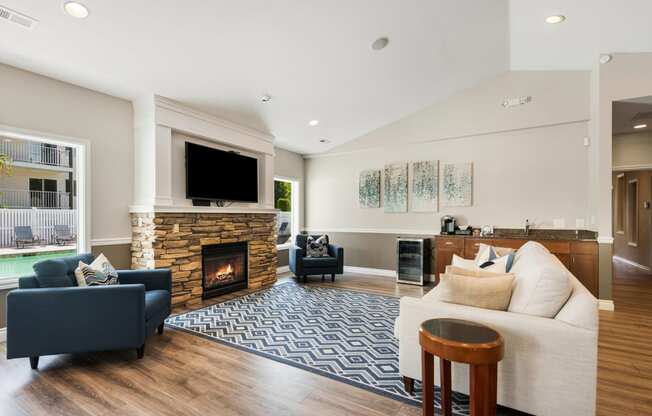 a living room with a fireplace and a couch