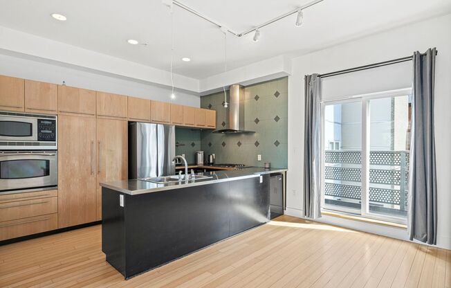 Modern 3BD, 3.5BA Five Points Townhome with 2 Balconies and 2 Parking Spots