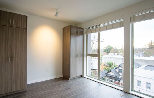 Modern + Chic Top Floor Studio Ready Early September!