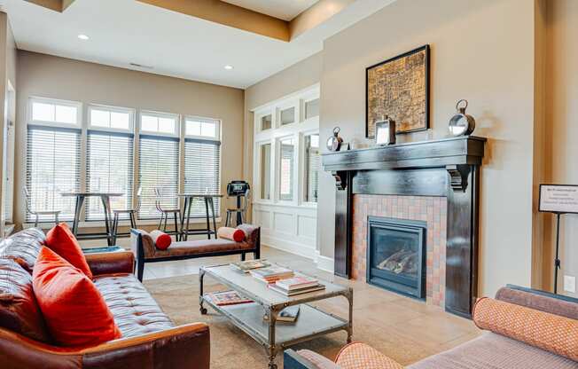 a living room with a fireplace and couches