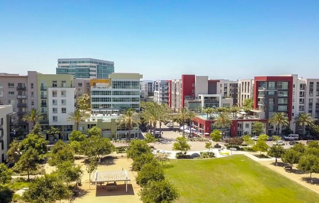 A cityscape with a mix of residential and commercial buildings.