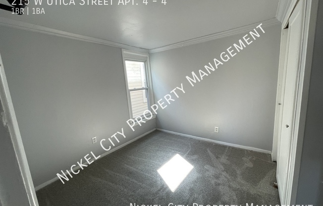 215 W UTICA ST