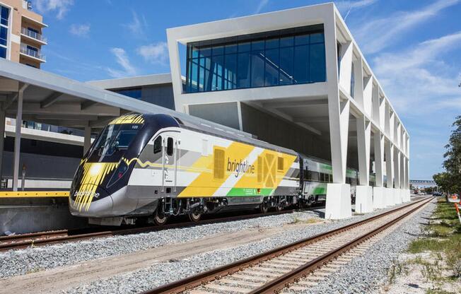 The Brightline train stops right across the street