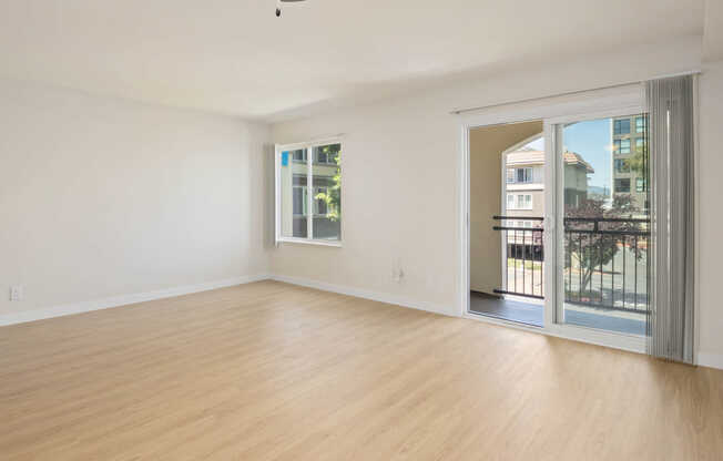 Living Room with Balcony and Hard Surface Flooring