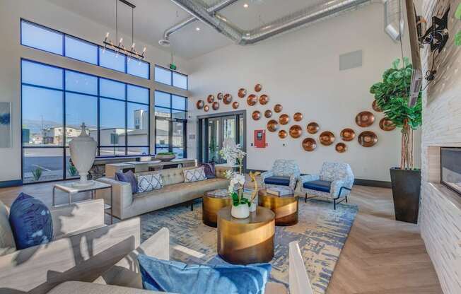 A modern living room with a large window and a view of the city.