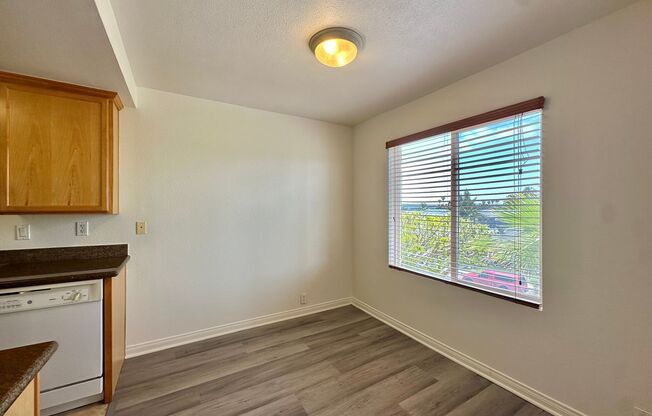 Updated Crown Point Condo With Wood Style Flooring Throughout And Bay Views From Balcony