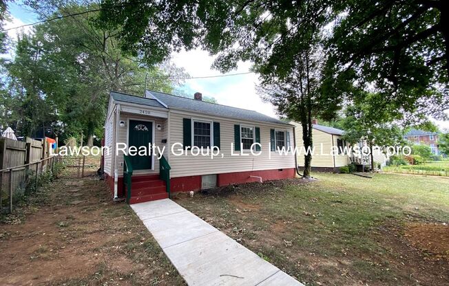 Adorable Cottage with Unique Interior Design and Fenced Yard