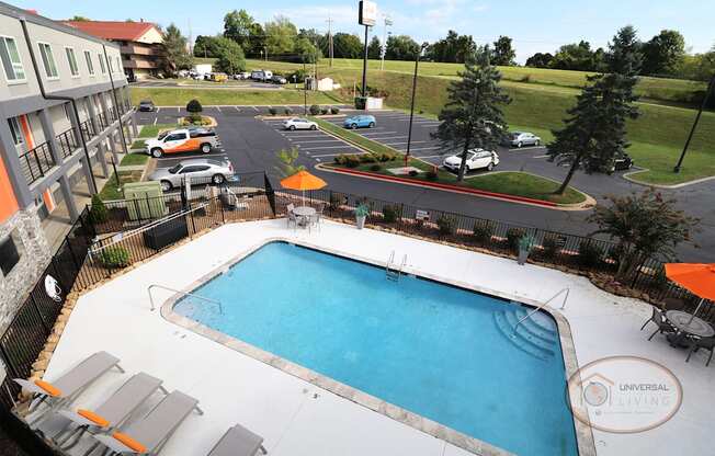 An aerial view of the pool and parking lot.