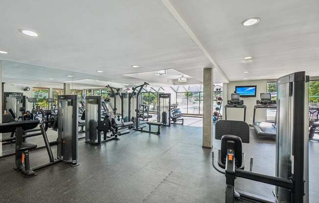 A spacious 24/7 fitness center with Peloton and LifeFitness equipment