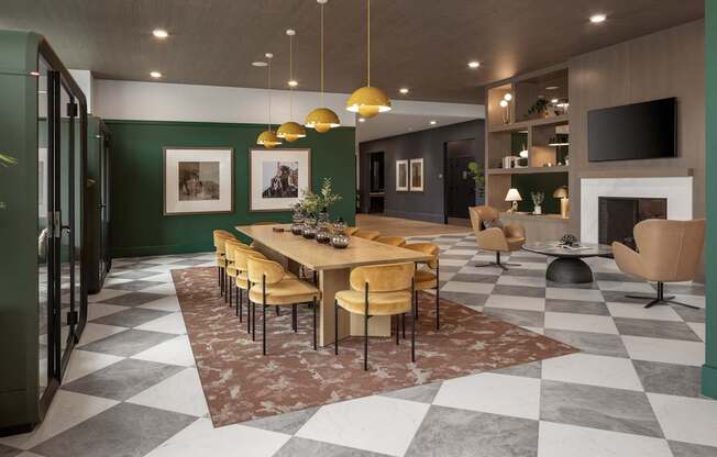 A dining room with a checkered floor and a long table with chairs.