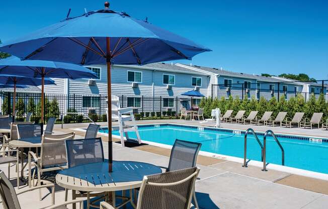 outdoor pool with sunbrellas at Southwood Luxury Apartments, New York