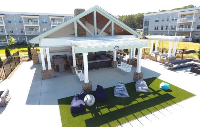 an overhead view of a pavilion with lounge furniture in an apartment complex