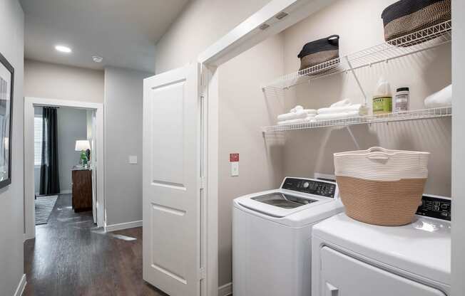 our apartments offer a laundry room with washer and dryer at 55 Fifty at Northwest Crossing, Houston, TX