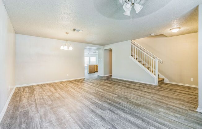 Spacious 4-Bedroom Home with Open Floor Plan & Brick Fireplace