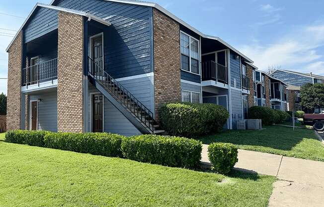 our apartments are located in a quiet neighborhood with green grass