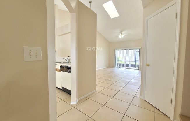 Spacious 3-Bed Townhome with 1st-Floor Main Bedroom within Lakepoint in Kissimmee