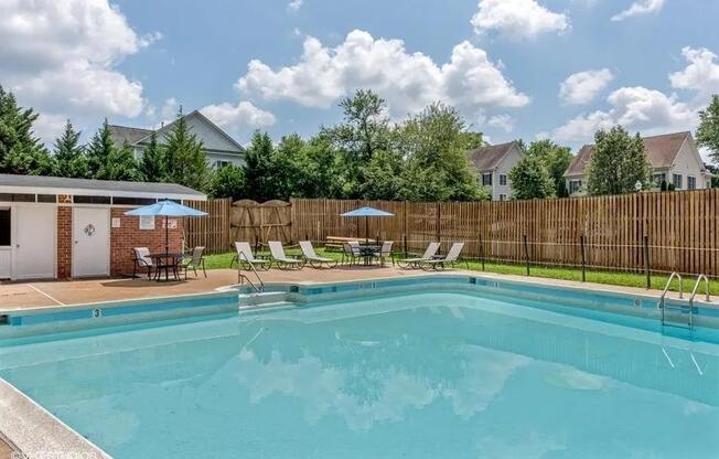 Outside pool with lounge chair