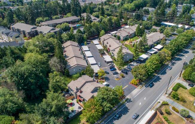 an aerial view of a neighborhood with houses and trees at Quartz Creek, Mountlake Terrace