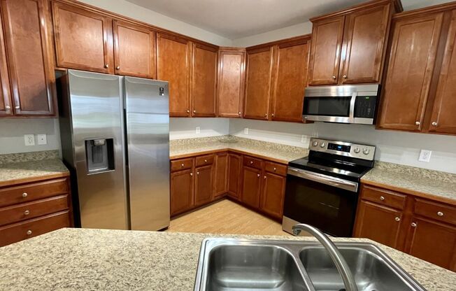 Updated Townhome with Garage & Screened in Porch