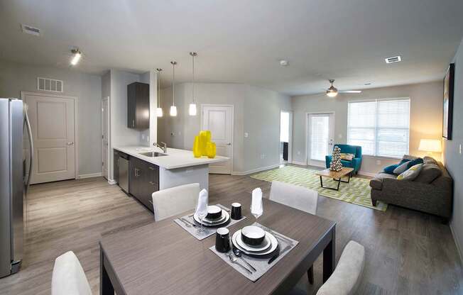 Hardwood-inspired flooring in living room and kitchen areas