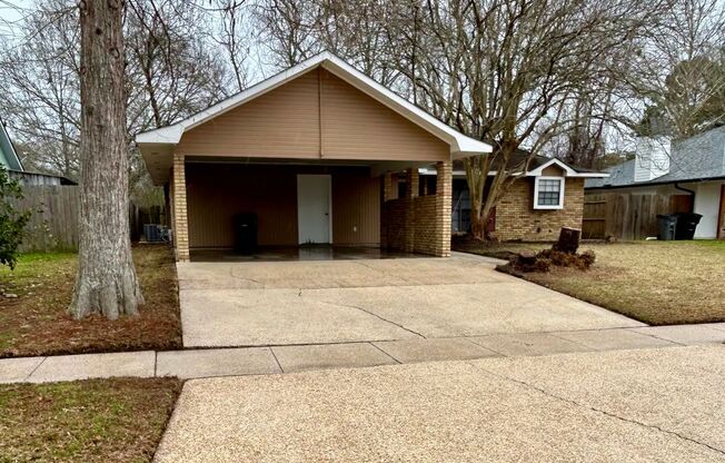 3 bed /2 bath house right by Highland Rd. Park! New flooring and paint