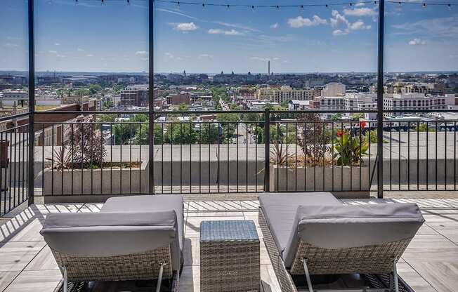 Rooftop deck with lounge chairs at Highview and Castle Manor, Washington, 20009