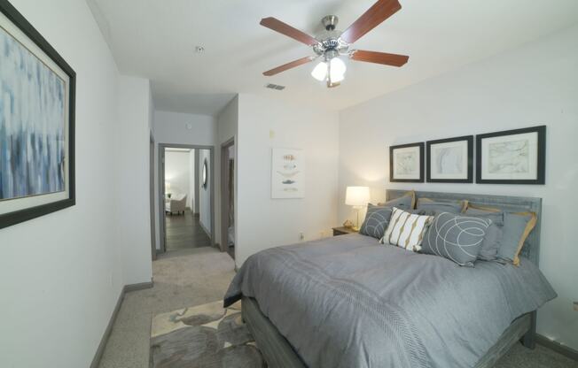 a bedroom with a bed and a ceiling fan at The Shallowford, Chattanooga, TN, 37421