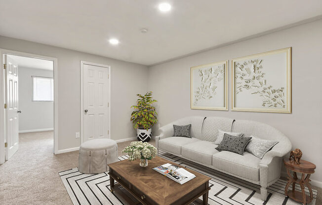 a living room with a couch and a coffee table